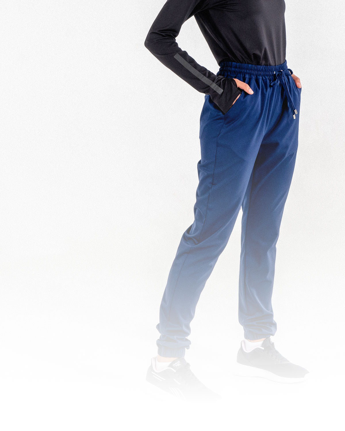 A close-up of the dark blue Glider Drawstring Jogger, a modest activewear jogger from Veil Garments.
