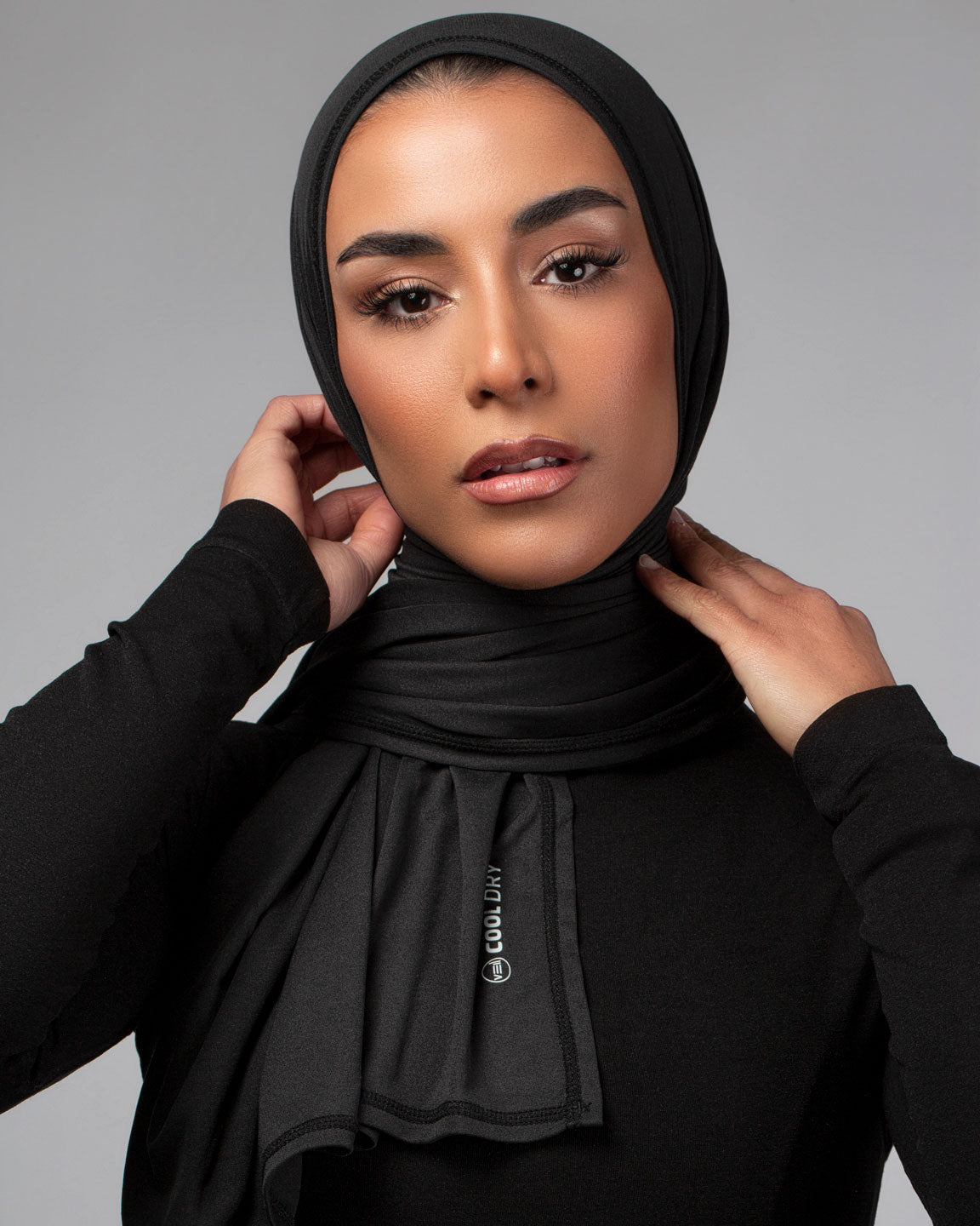 Cool Dry Shawl 2.0 in black by Veil Garments. Sports hijab collection.