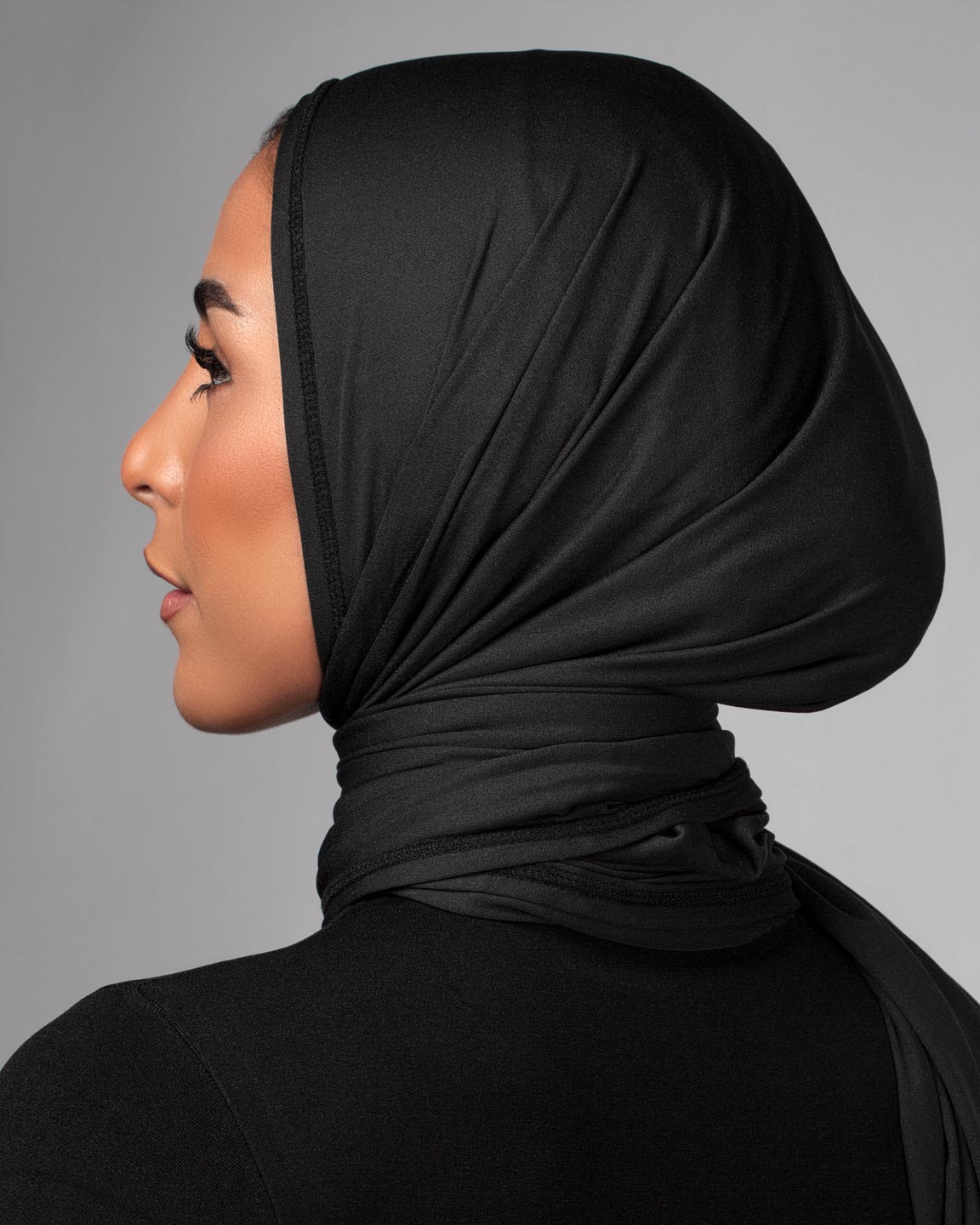 Cool Dry Shawl 2.0 in black by Veil Garments. Sports hijab collection.