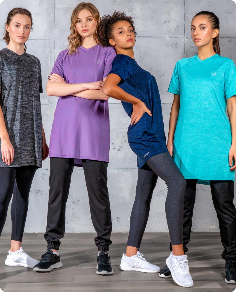 Four females wearing Veil Garments' modest activewear, consisting of the Connect T-Shirt Dress and Glider Drawstring Jogger.
