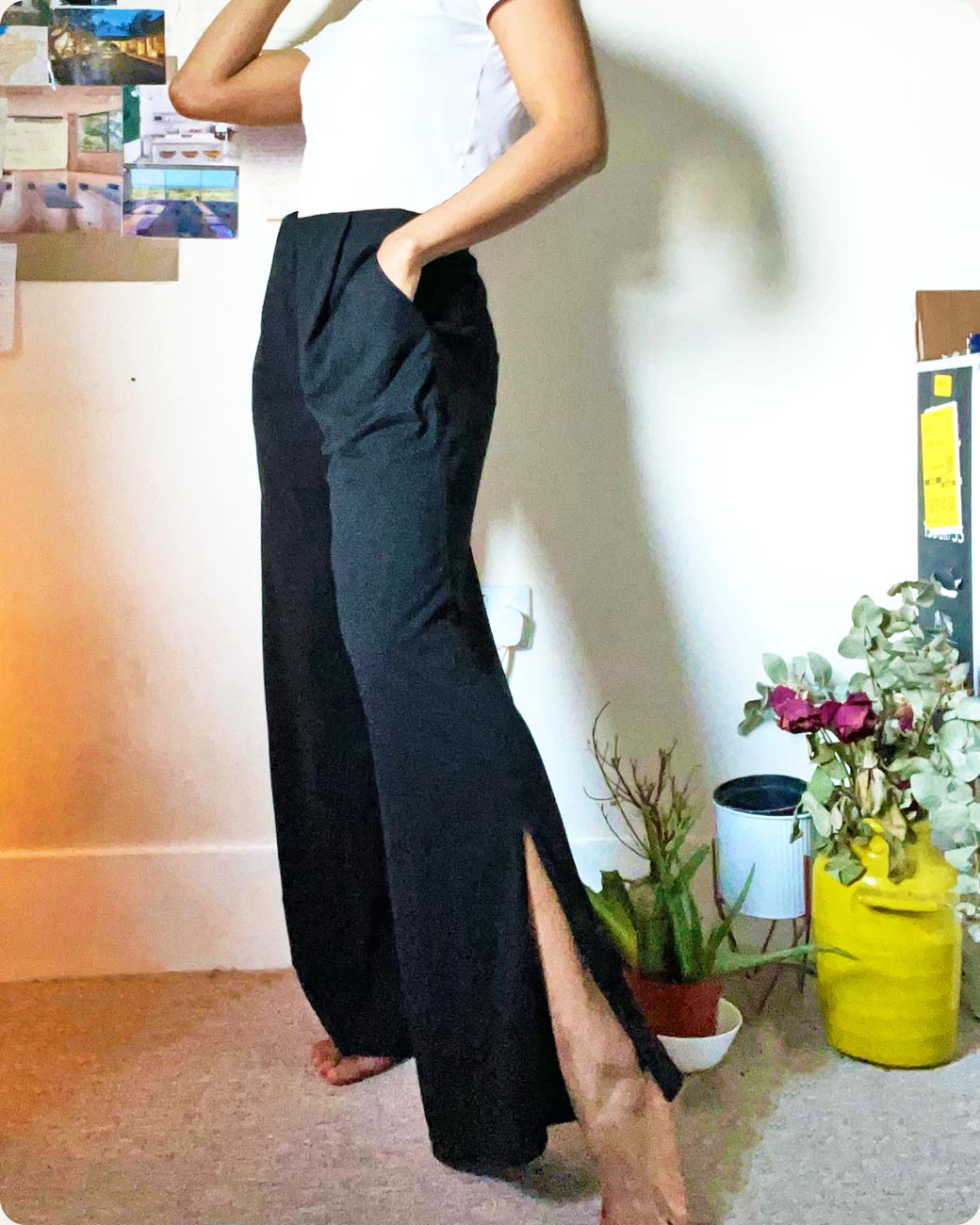 A close-up of a customer wearing a black Swift Wide-Leg Sweatpant, a modest activewear sweatpant from Veil Garments.