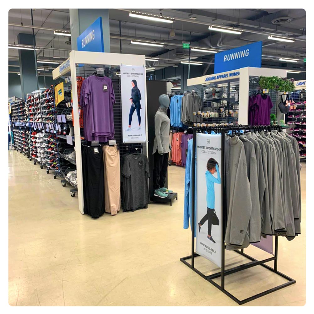 Veil Garments modest activewear bring displayed in an international sporting goods retailer.