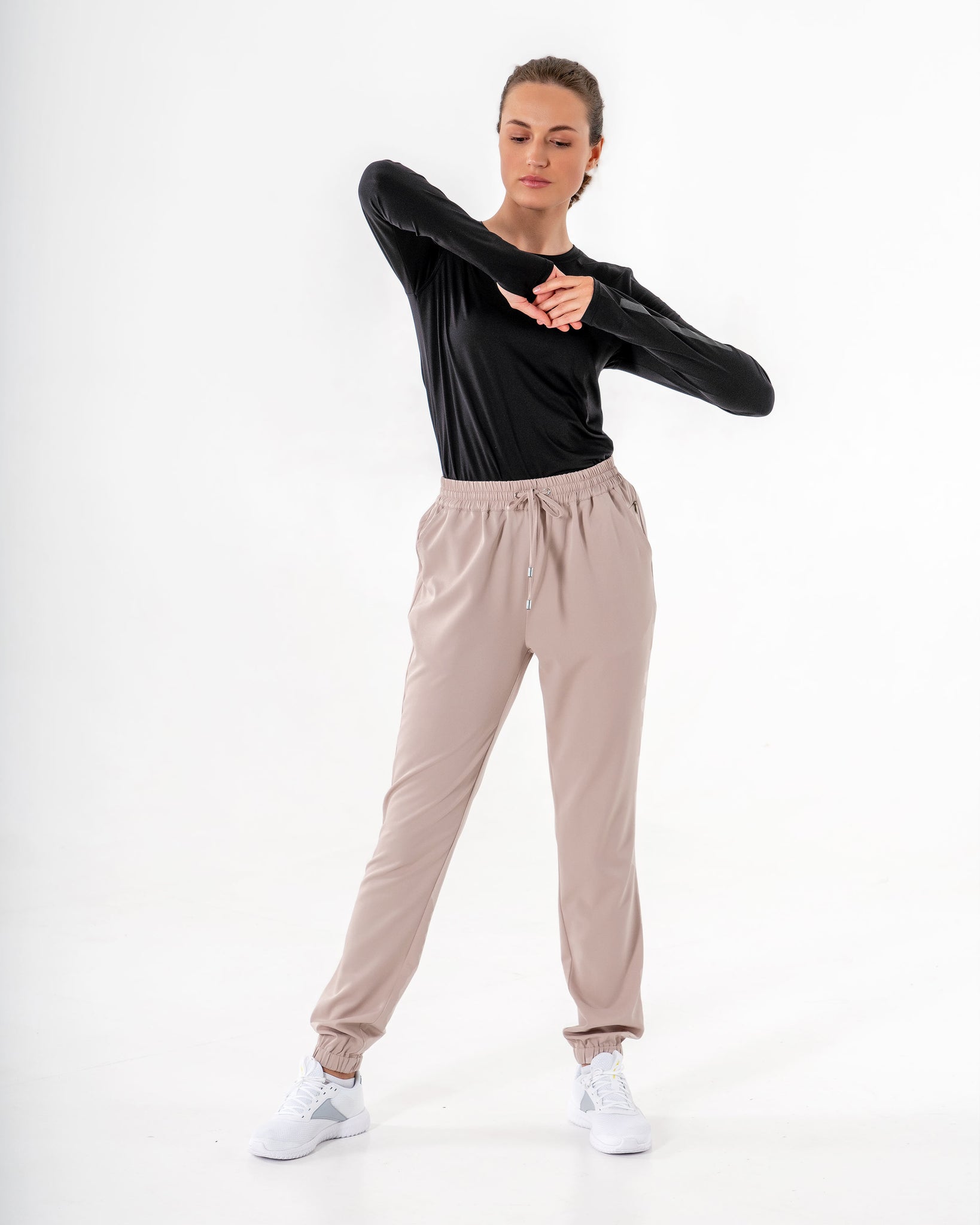 Glider Drawstring Jogger in beige by Veil Garments. Modest activewear collection.