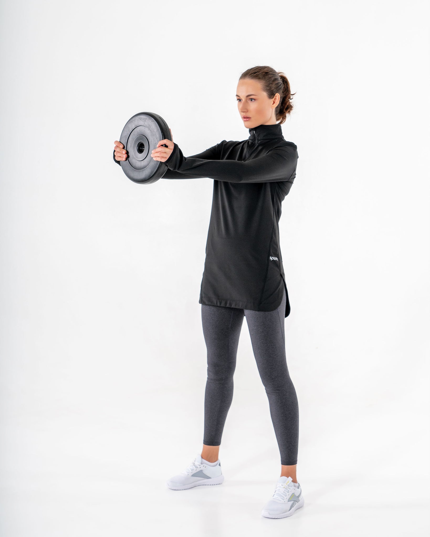 Spark Half-Zip in black by Veil Garments. Modest activewear collection.