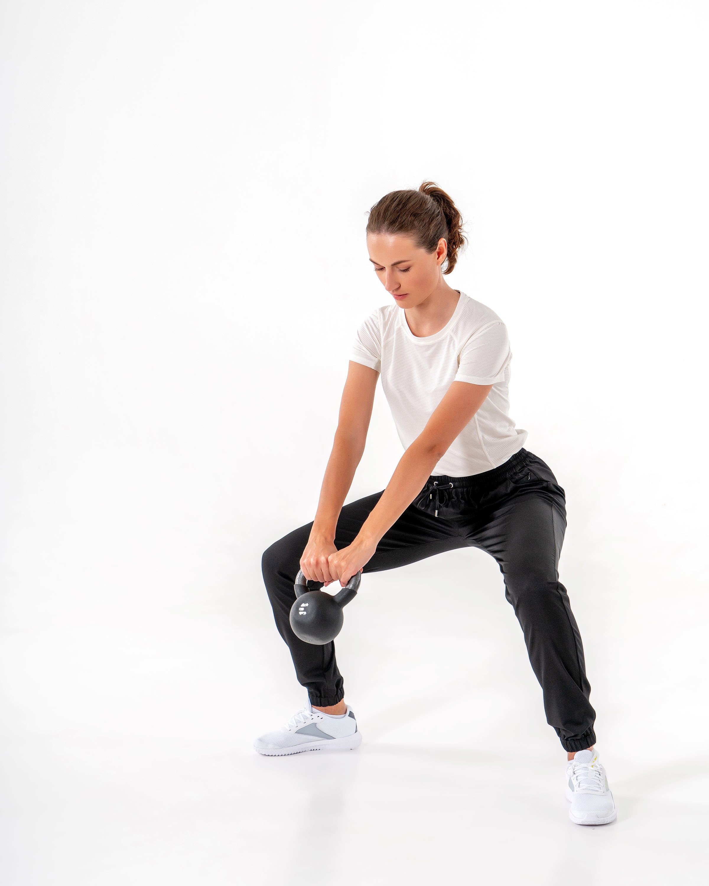 Glider Drawstring Jogger in Black by Veil Garments. Modest activewear collection.

#color_black