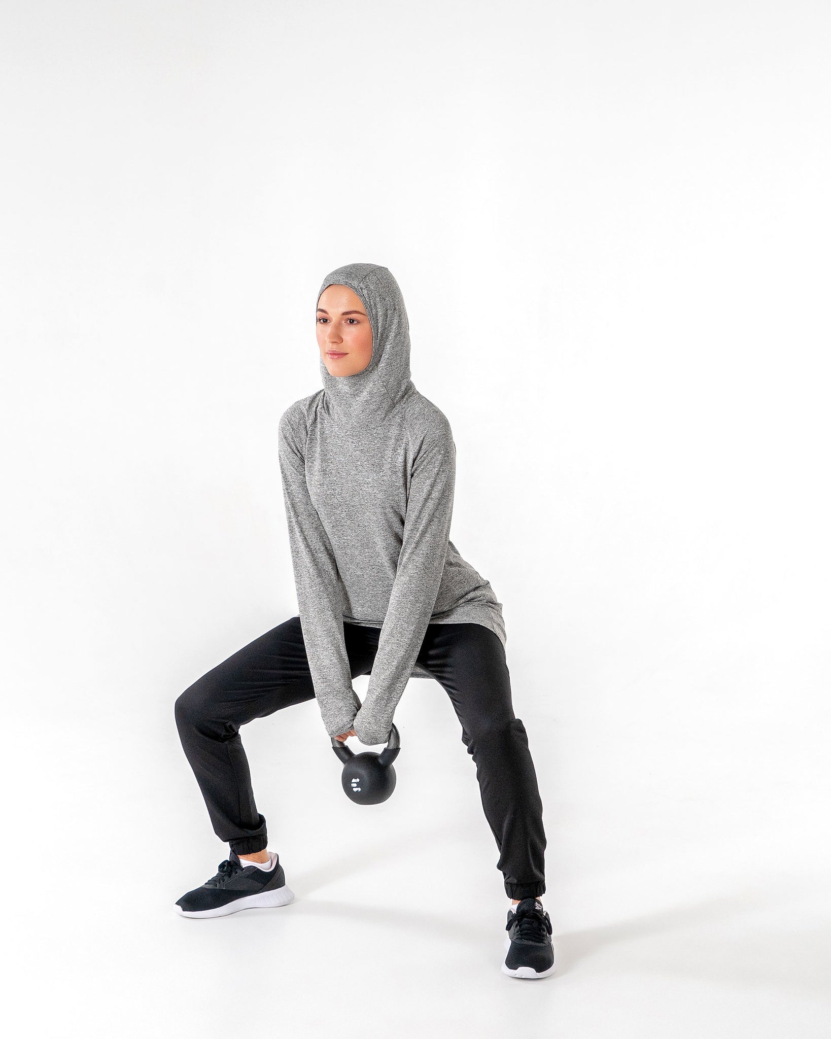 Halo Running Hoodie in heathered grey by Veil Garments. Modest activewear collection.