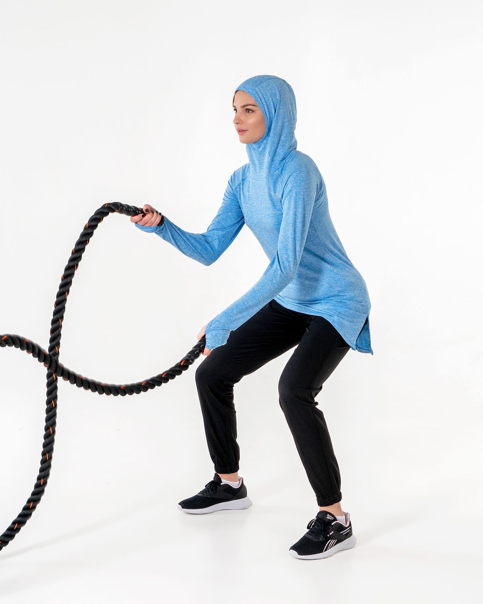 Halo Running Hoodie in heathered blue by Veil Garments. Modest activewear collection.