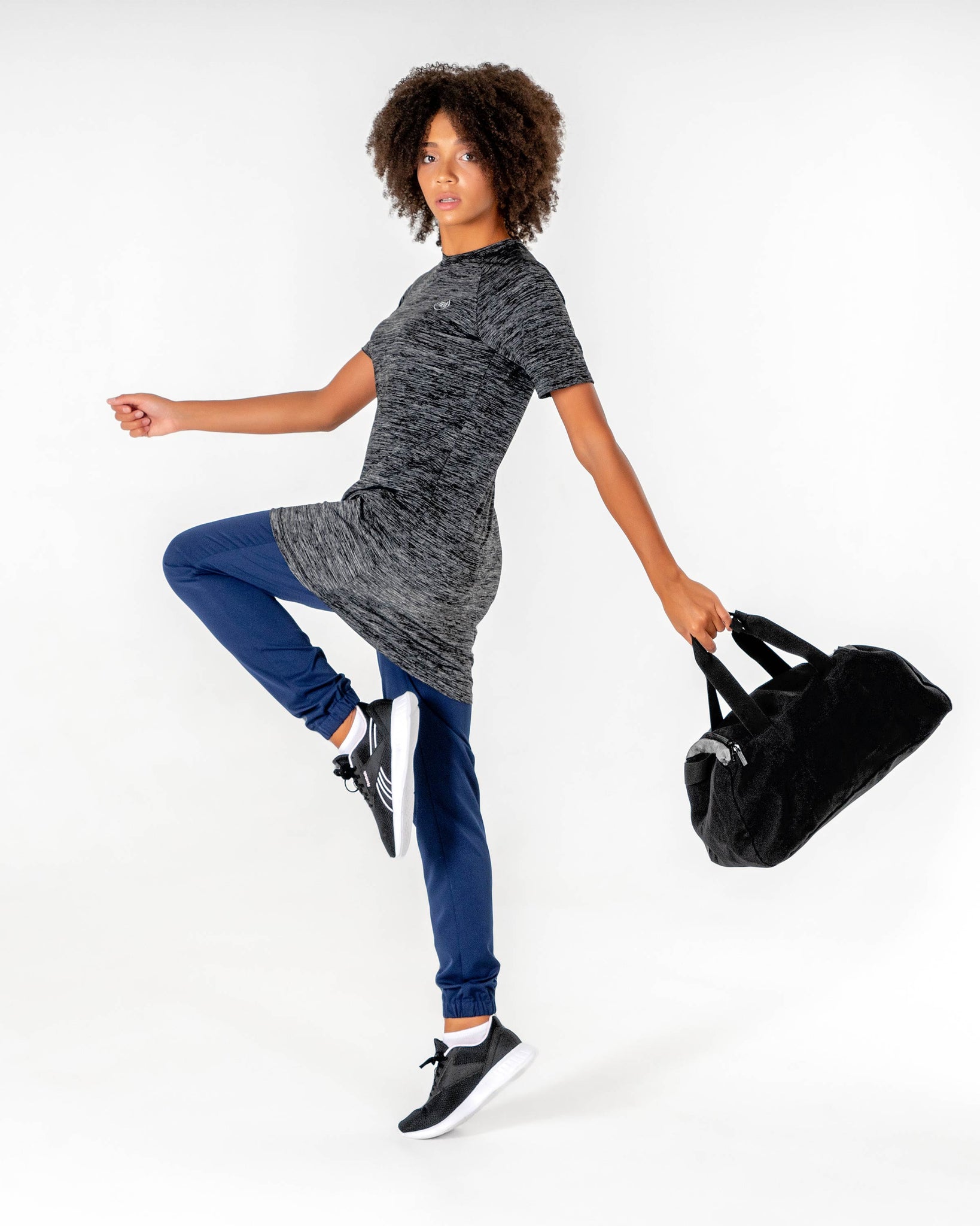 Connect T-Shirt Dress in Black by Veil Garments. Modest activewear collection.