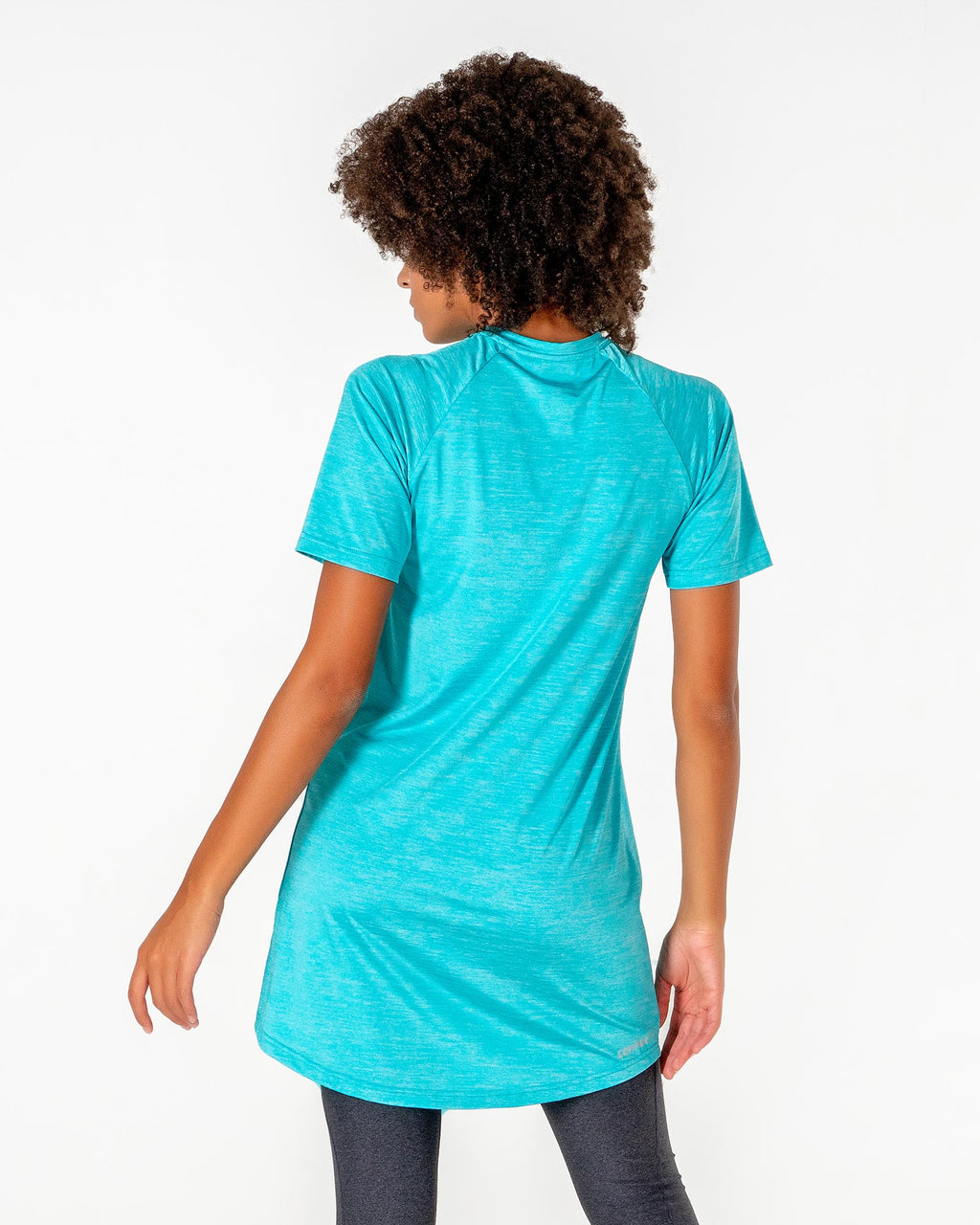 Back of the Connect T-Shirt Dress in Turquoise/Metallic Silver, showing the raglan seams and the curved hem.

#color_turquoise-metallic-silver