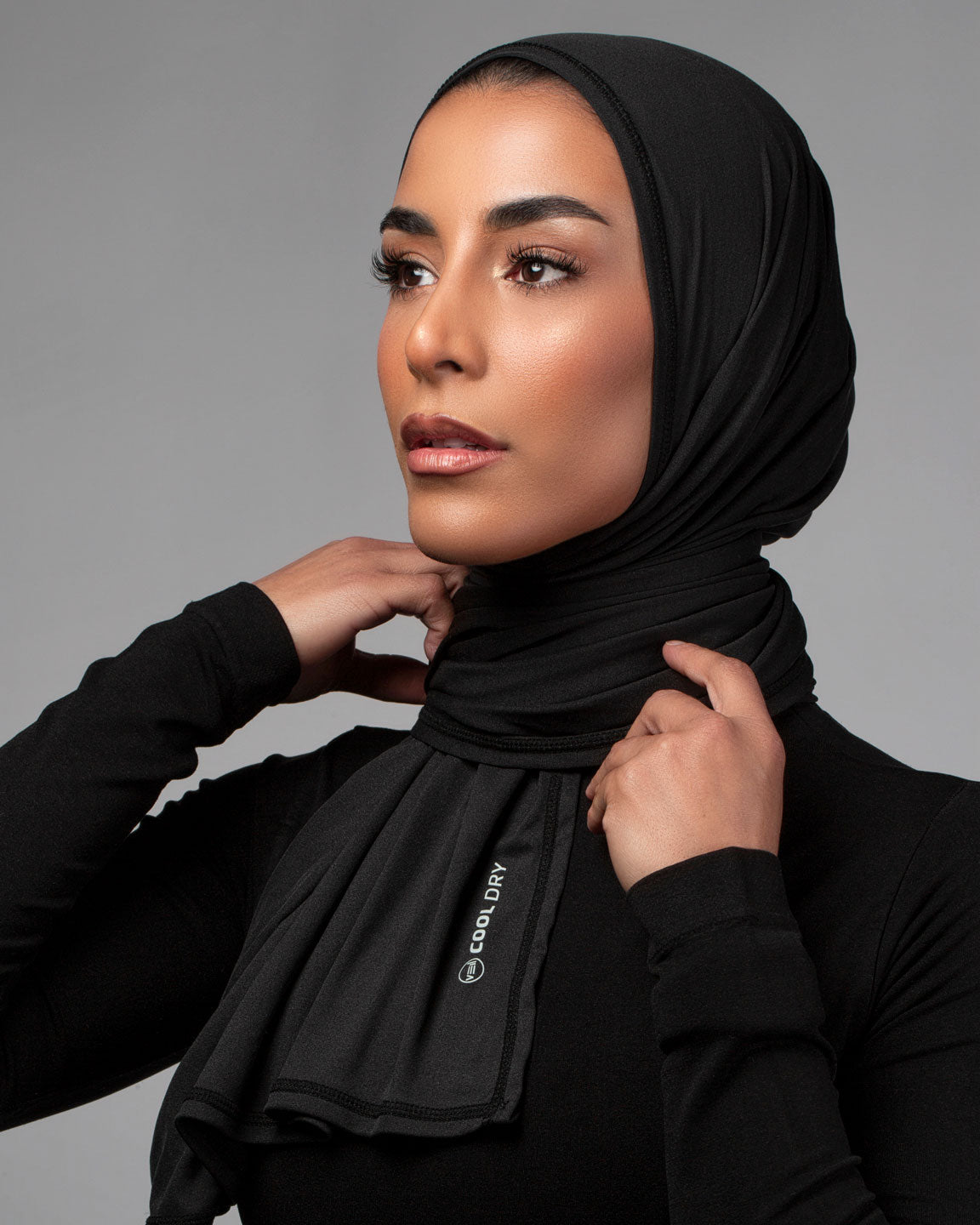 Cool Dry Shawl 2.0 in black by Veil Garments. Sports hijab collection.