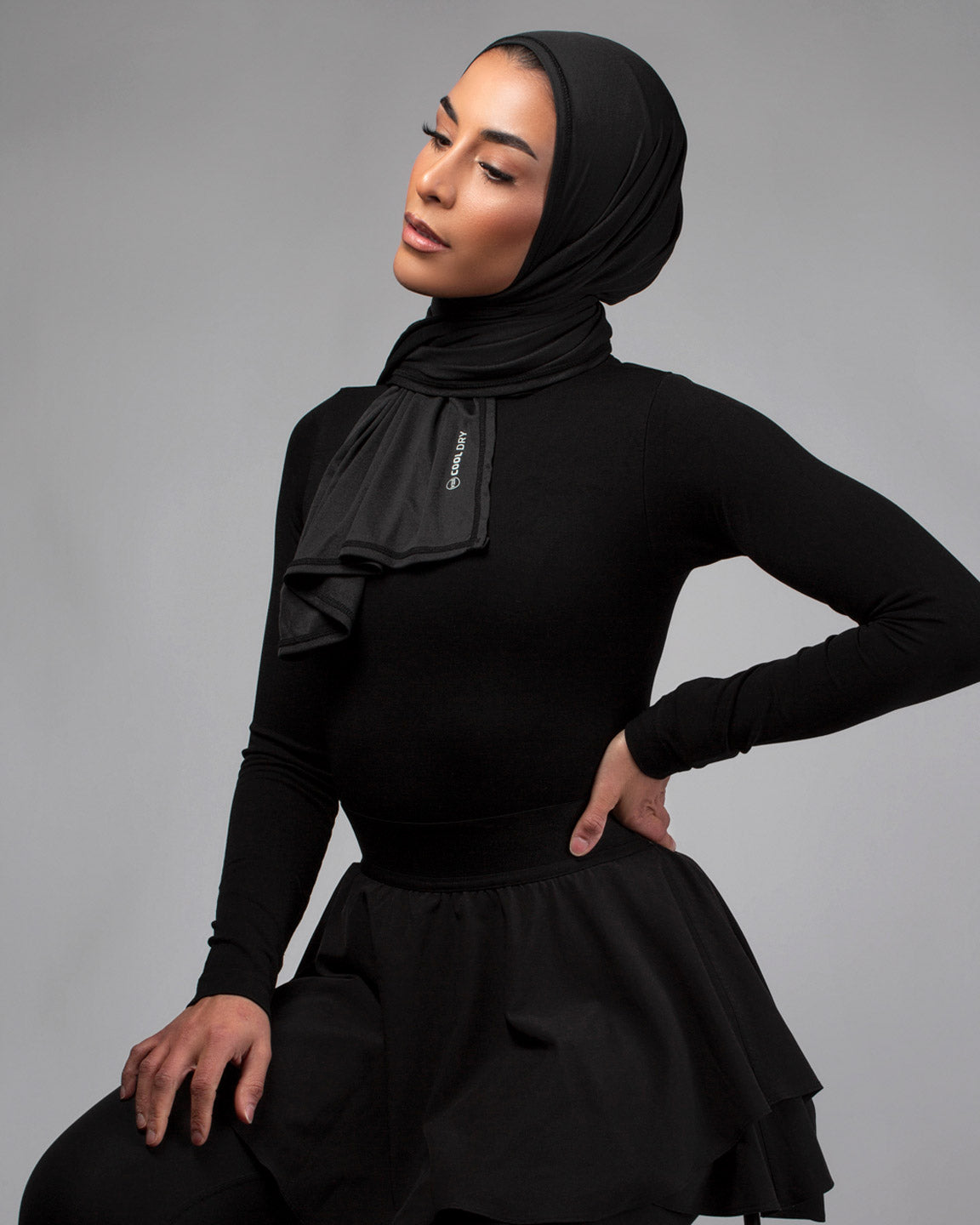 Cool Dry Shawl 2.0 in black by Veil Garments. Sports hijab collection.